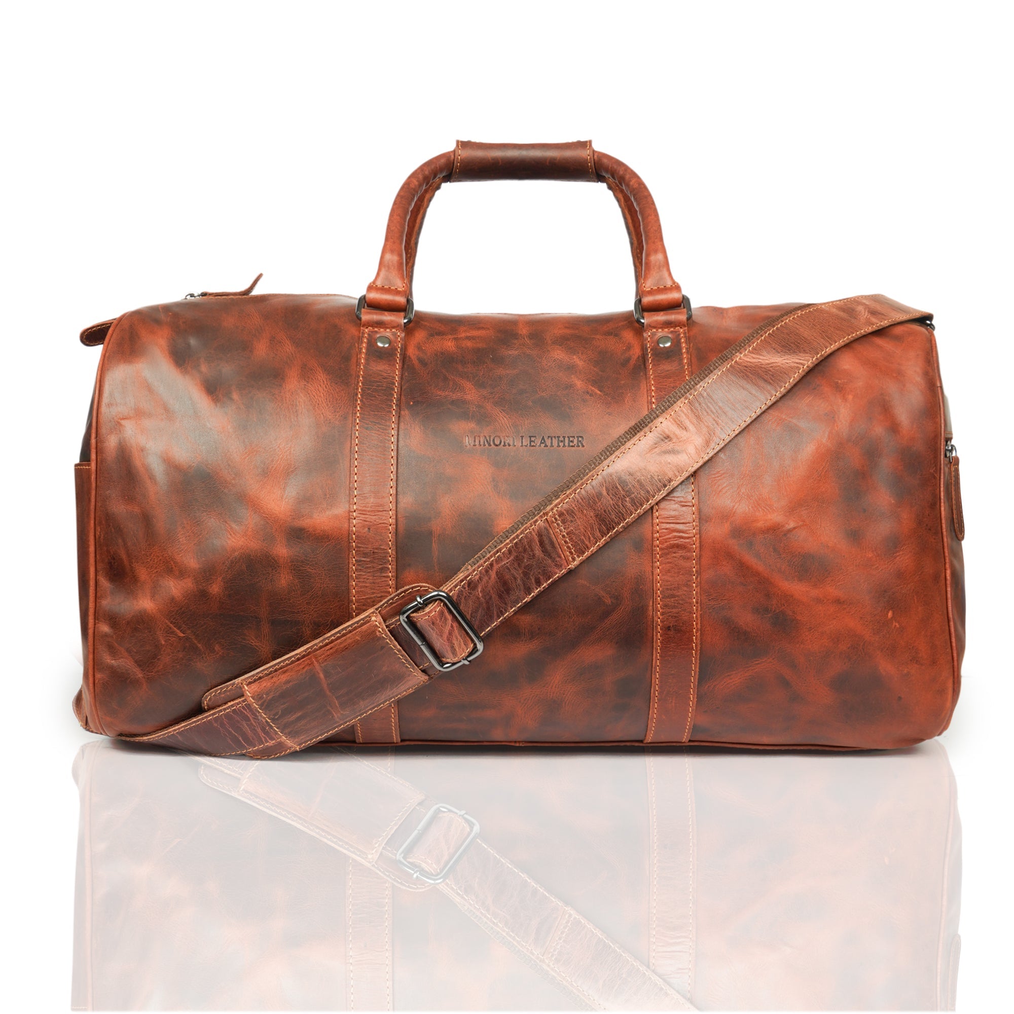Minori Leather Jackson leather weekender duffle bag with sturdy handles and spacious interior for travel and weekend trips.